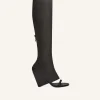 OBLIQUE WEDGED LEATHER BOOTS
